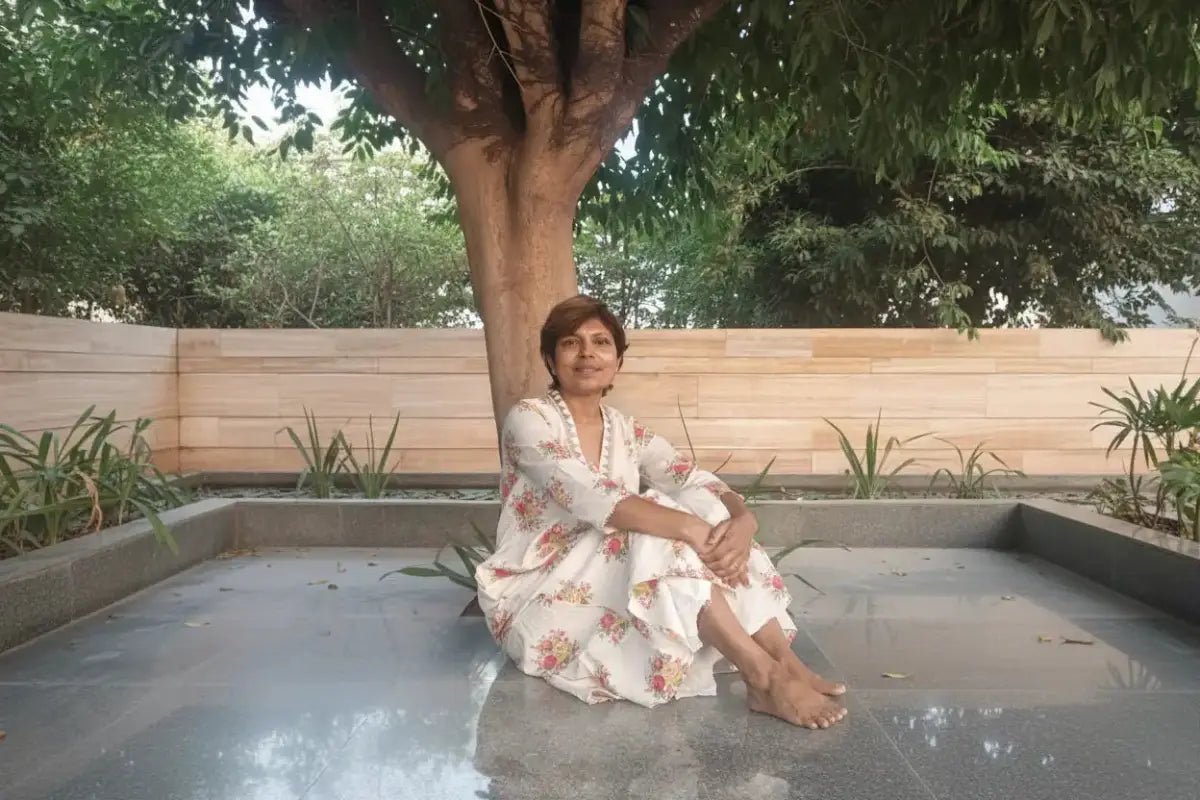 Cult of Chill founder in a quiet outdoor moment, seated under a tree